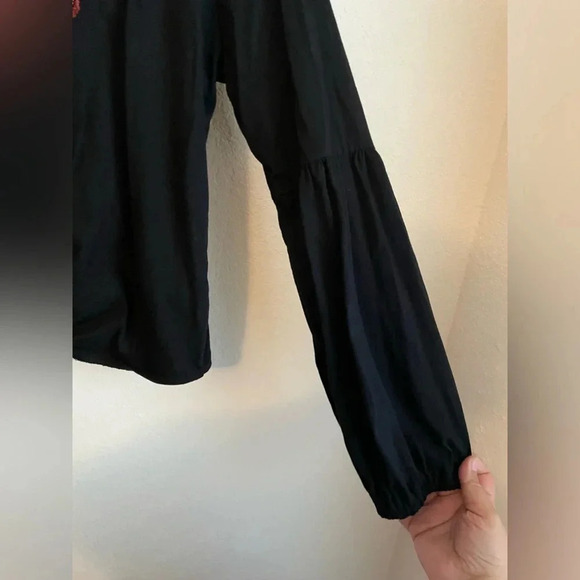 Elegant Black 3/4 Sleeve Blouse with Tie Front and Red Embellishments - Picture 6 of 8